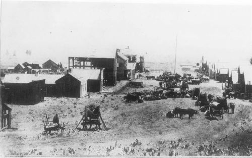 photo of early Susanville, with horses and old buildings